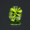 An image of a custom cut oval peridot gemstone.
