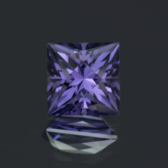 A radiant square cut lab-created color change sapphire.