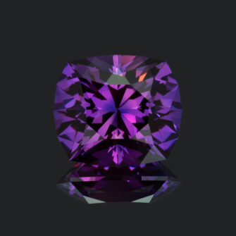 An image of a precision cut large lab-created purple sapphire.