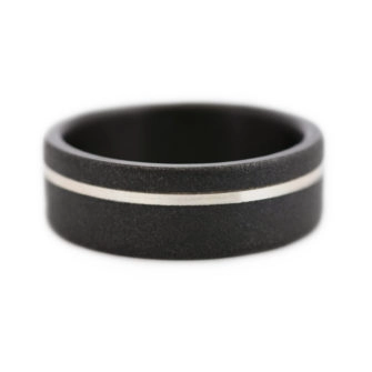 An image of a black zirconium with a gold inlay.