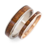Custom wood engagement rings made from a warship boat.