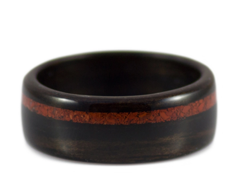 A bentwood ring made with an inlay of red jasper