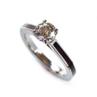 Wooden engagement ring inlaid with ebony