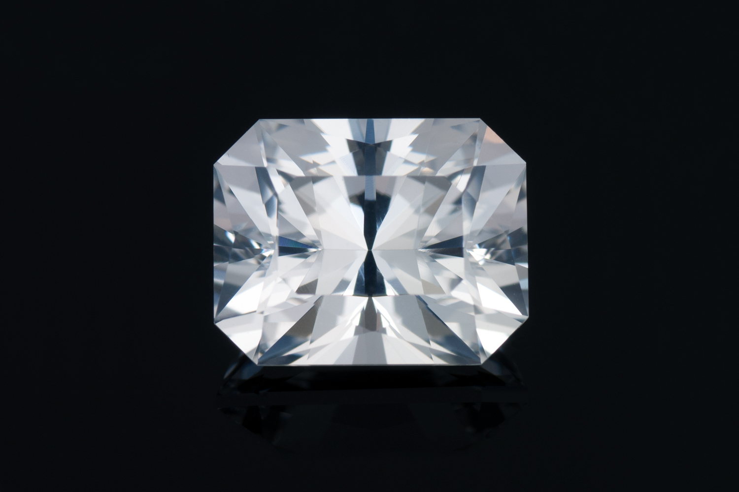 An image of a radiant cut lab-grown white sapphire.