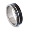 An image of a ring made from meteorite and walnut