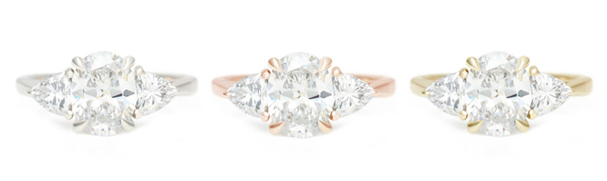 A picture of Canadian made moissanite engagement rings in white, rose, and yellow gold.