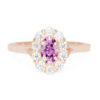 A picture of an oval cut pink moissanite engagement ring in 14k rose gold.