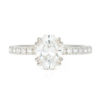 An image of an oval cut moissanite engagement ring set with a Charles and Colvard moissanite.