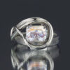 A rainbow moonstone ring with a sculpted and flowing band.