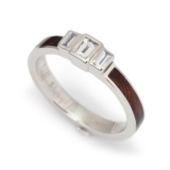 A soft-focus shot showcasing the diamonds and wood together.