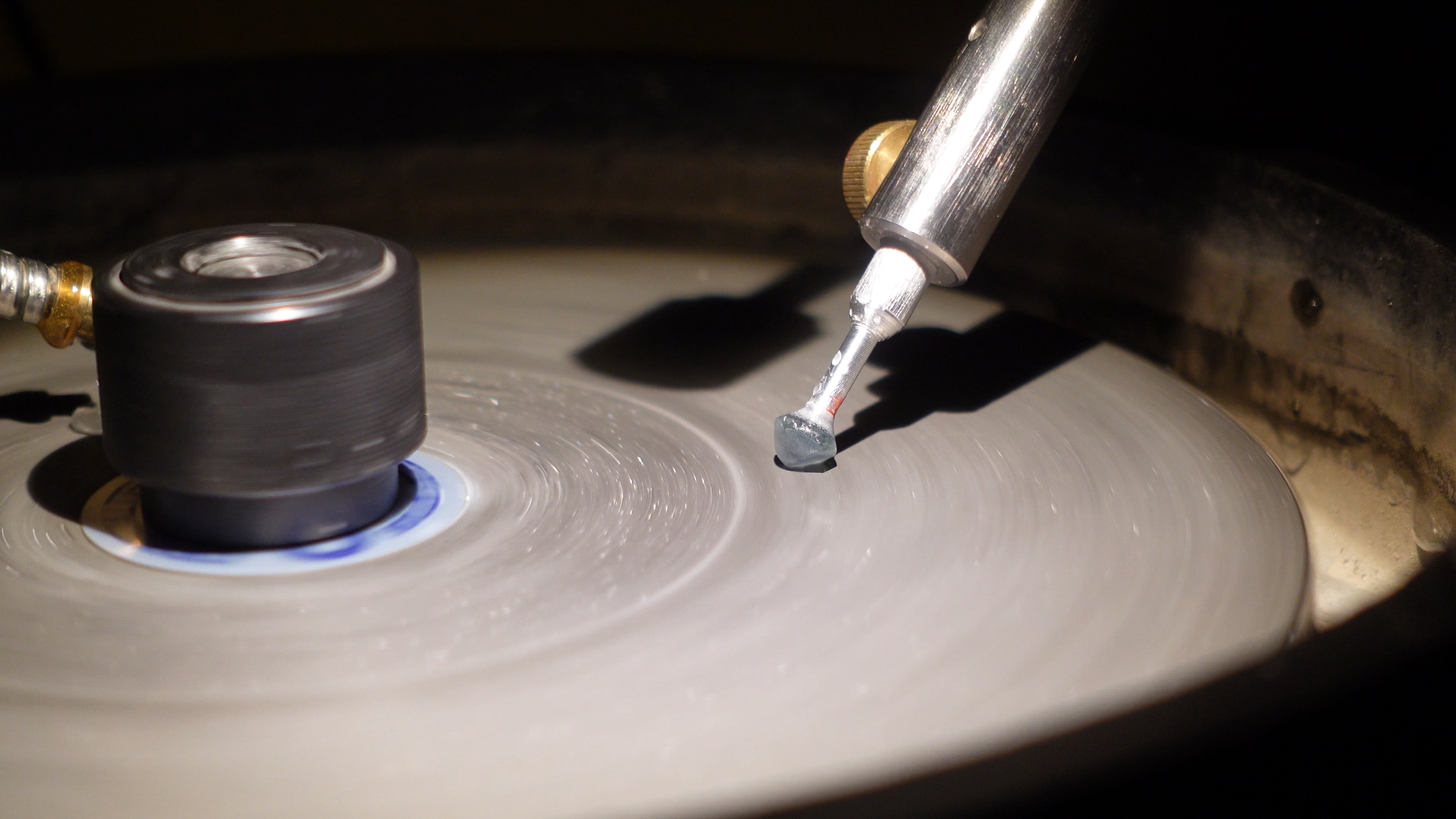 Faceting a Montana sapphire.