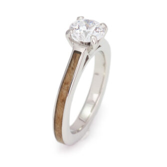 Side profile of our Asian satinwood wood engagement ring, showing the depth and contour of the wooden band.