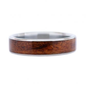 A picture of a metal and rosewood ring