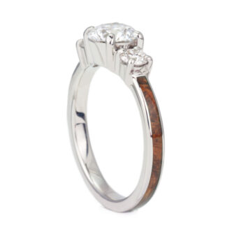 Our 1 carat three diamond wooden engagement ring, shown here in a profile view.