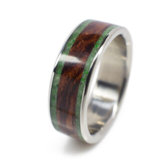 The unique design of our jade, wood and metal ring, where modern meets timeless in jewelry craftsmanship.