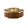 A unique men's wedding ring with wood.