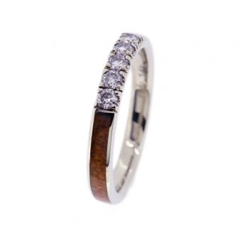 Side view of wooden ring displaying the kauri wood.