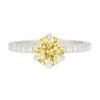 A picture of a 1.30 carat diamond equivalent yellow moissanite engagement ring.